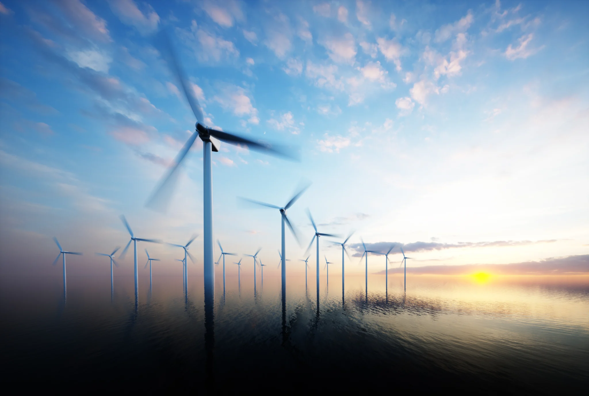 Surreal view of an offshore wind power farm with turbine blades spinning.