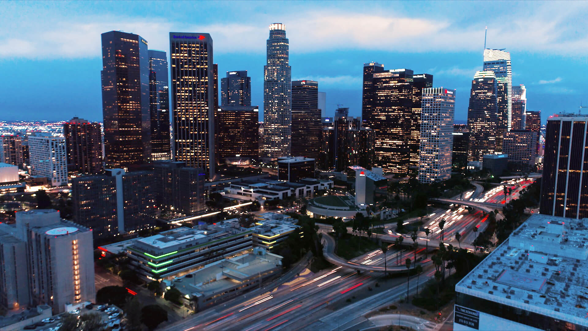 The skyline of Los Angeles at night, lit using renewabe energy.