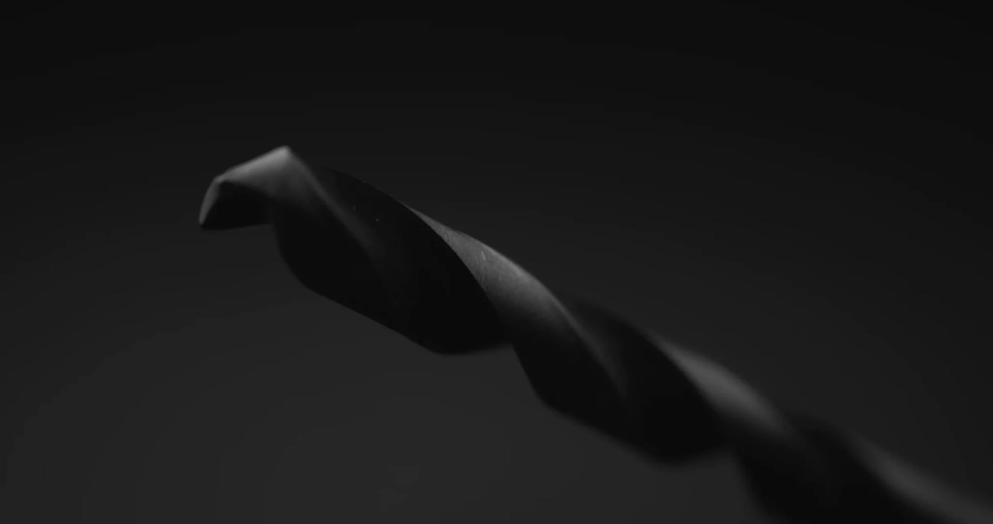 A heavy drill bit.
