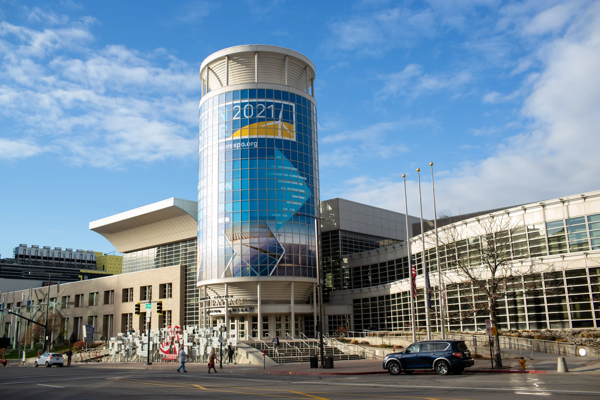 A photo of the outside of a large building with lots of windows