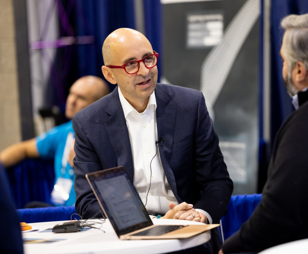 ACP's Chief Advocacy Officer JC Sandberg talking with an ACP conference attendee.