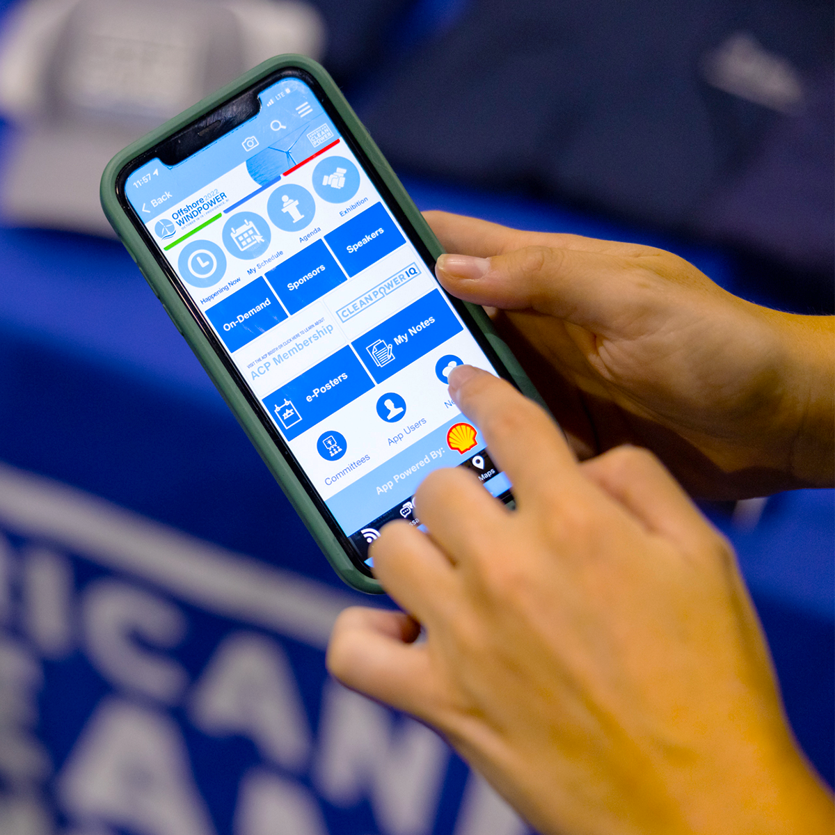 Sponsorship opportunity for ACP conference event app - a person navigates the ACP conference app.