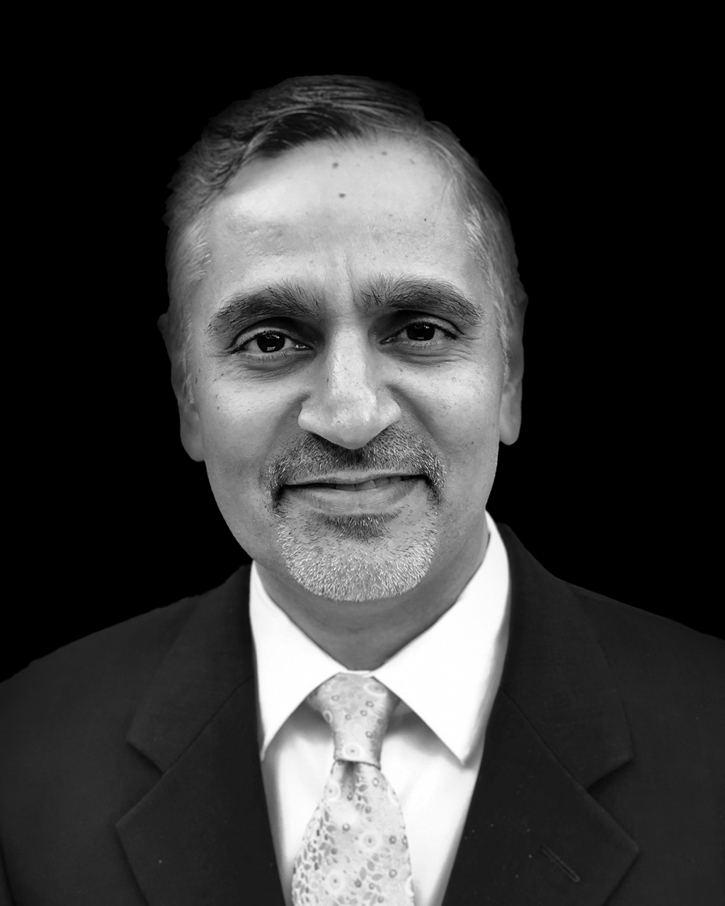 Headshot of Puneet Verma, Board Director.
