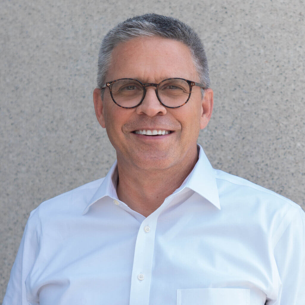 Headshot of John Rohde, CEO, Americas at RES.