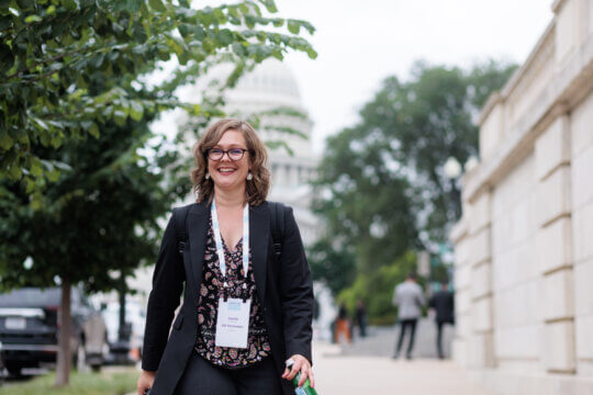An ACP Member Smiles Outside the Capitol.
