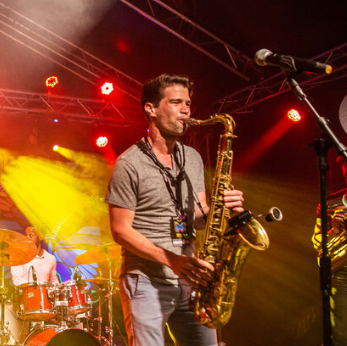 A Saxophonist Plays on Stage.