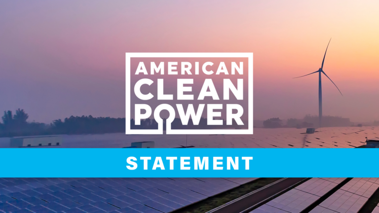 A solar and wind energy farm against a pastel sky with the words "American Clean Power Statement."
