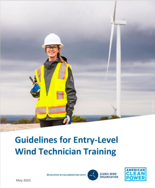 The cover page for ACP's Guidelines for Entry-Level Wind Technician Training, with a female wind turbine technician standing in front of a wind turbine and an overcast sky.
