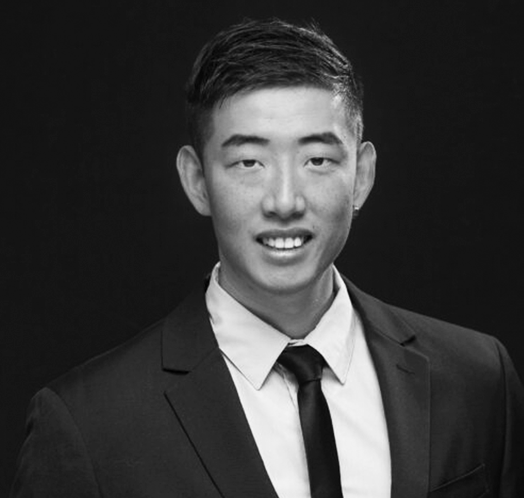 The headshot of Kai Wu, ACP's IT Support Manager.
