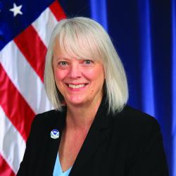 The headshot of Janet Coit, Assistant Administrator at National Oceanic and Atmospheric Administration (NOAA) Fishers and speaker at ACP's Offshore Windpower Conference 2023.