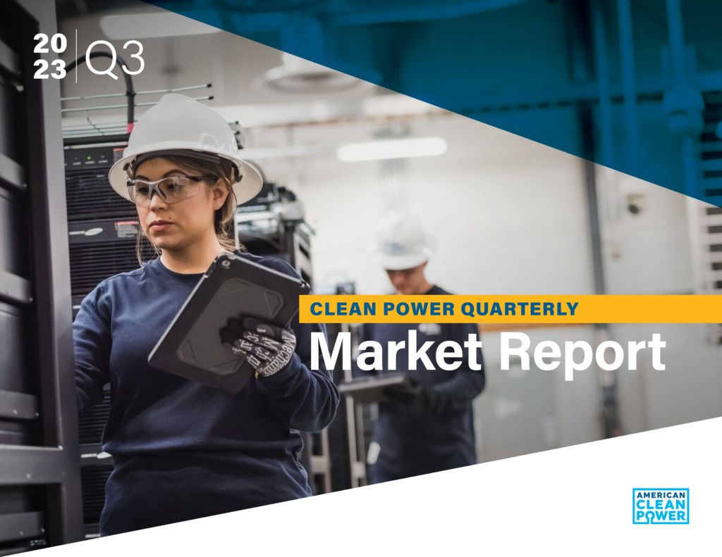The cover for ACP's Clean Power Quarterly Market Report Q3 2023, portraying two workers in hard hats.