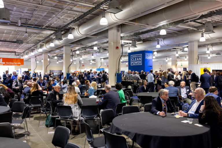 A crowded lunch area in an exhibit hall