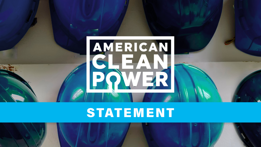 A few blue hard hats belonging to people with careers in the clean energy industry, overlain with the American Clean Power logo and the word "Statement."