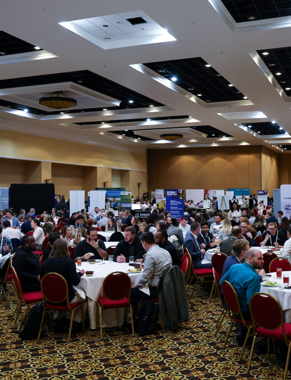 The crowded lunch room at the 2024 Siting & Permitting Conference