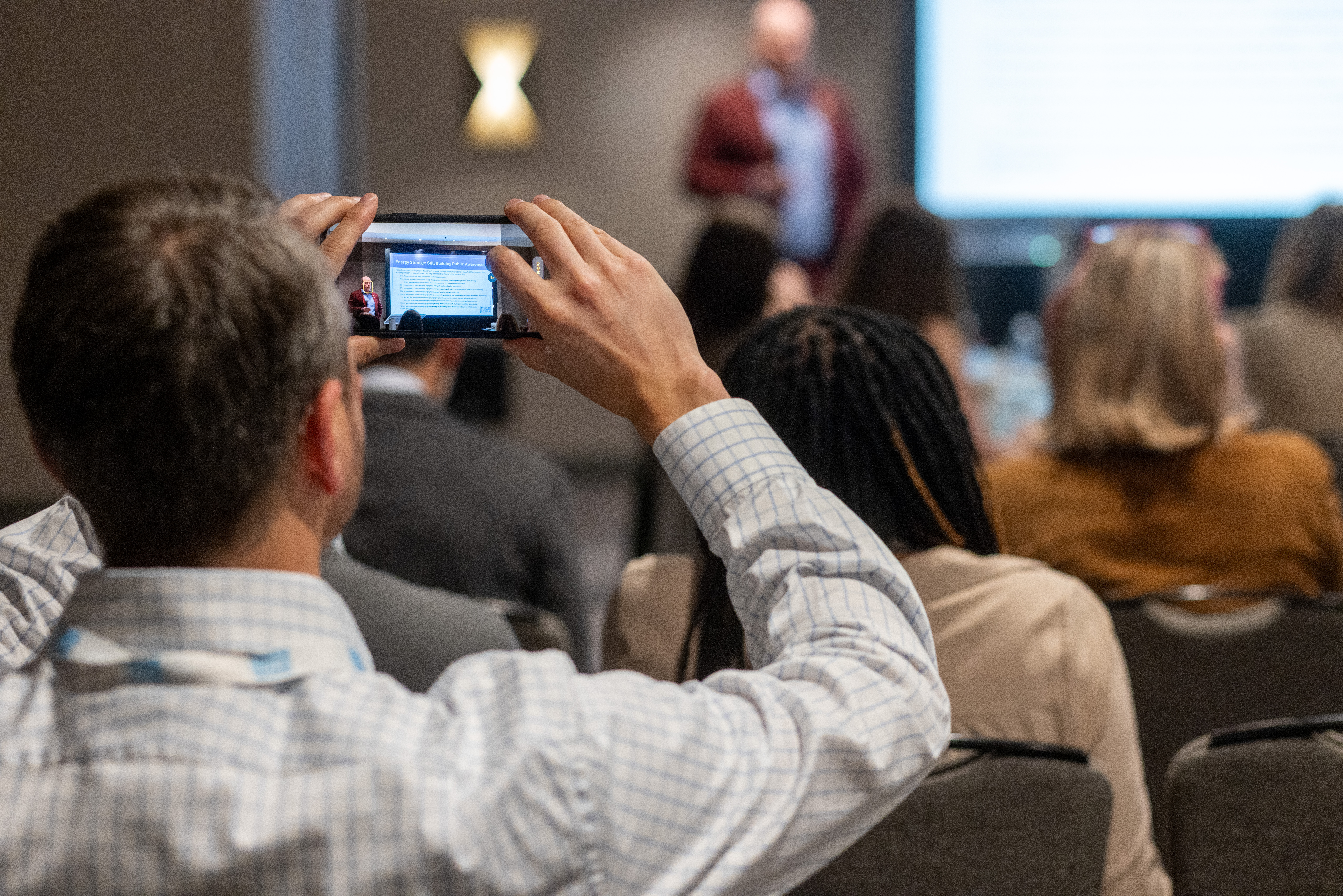 RECAHRGE - someone taking a photo