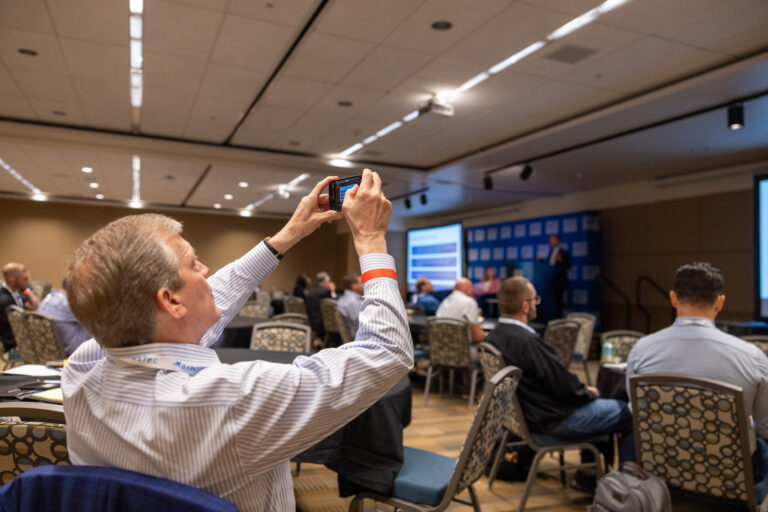 Man taking picture at CLEANPOWER