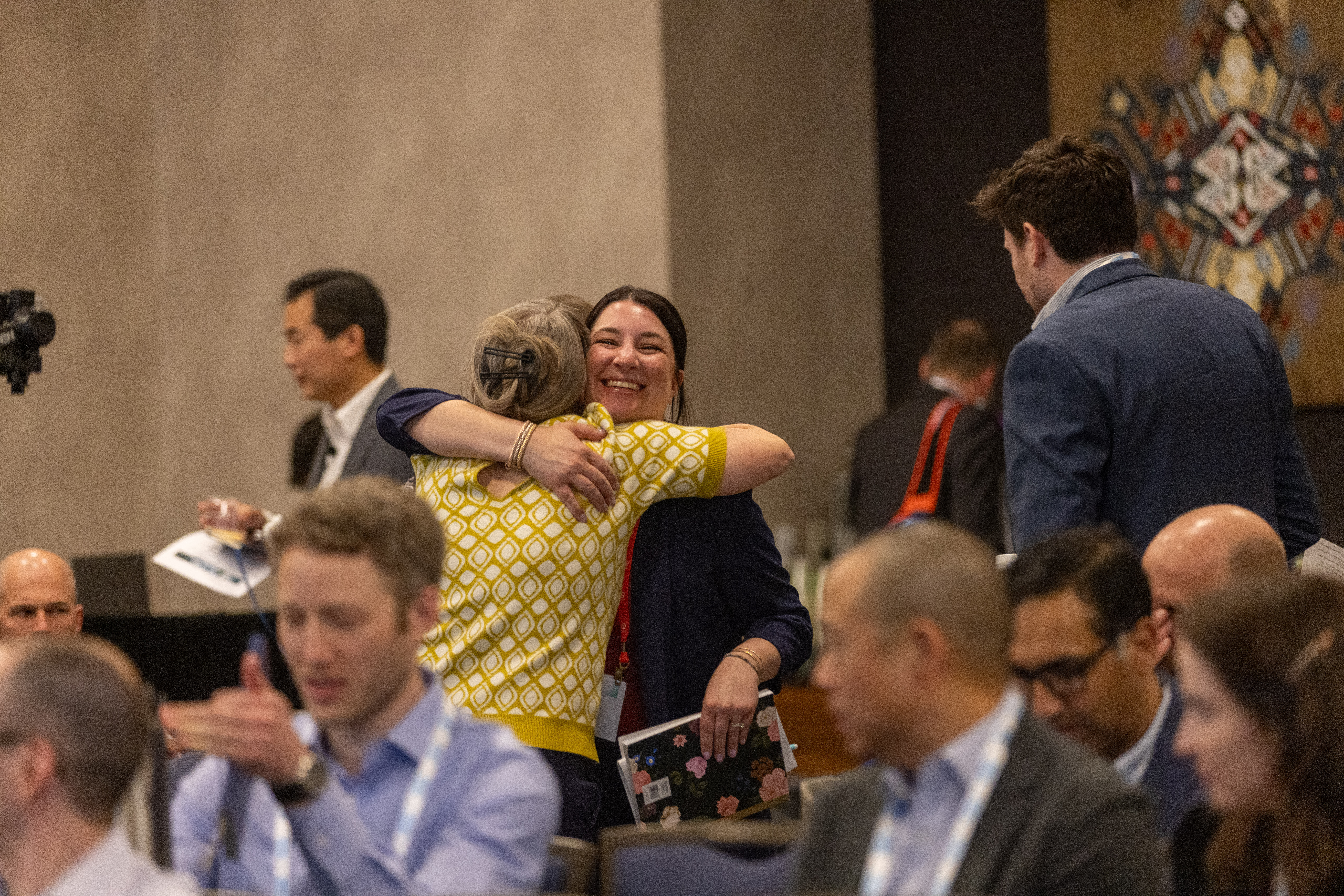 ACP PEAK attendees hugging